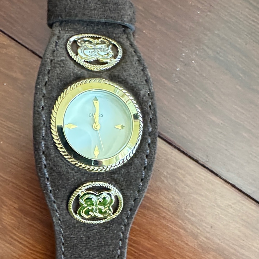 Guess Black and Gold Smartwatch with Green Details